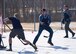 Members of Team Whiteman attempt to take control of the ball for their team in the first extramural hockey practice at Whiteman Air Force Base, Mo., Feb. 17, 2018. The teams were open to anyone who was interested in testing out their hockey skills or wanting learn more about street hockey in general. (U.S. Air Force photo by Staff Sgt. Danielle Quilla)