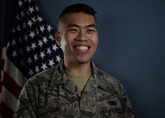 U.S. Air Force Airman 1st Class Dat Trinh, 33rd Fighter Wing administrative technician, was born in Vietnam and migrated to the United States with his family at the age of 11. At 23, Trinh followed in his older sister’s footsteps and enlisted in the military after spending a short period of time in college. (U.S. Air Force photo by Airman 1st Class Emily Smallwood)