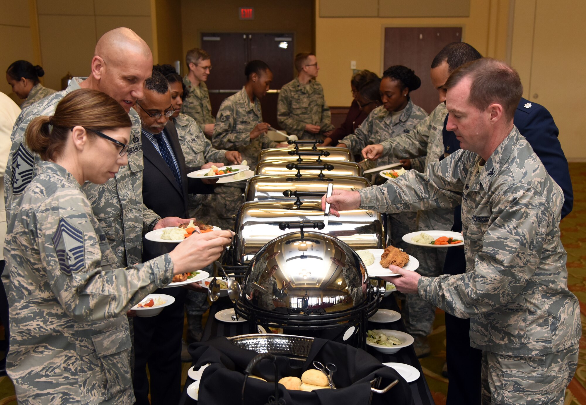 Keesler leadership attends the African-American Heritage Committee Luncheon at the Bay Breeze Event Center Feb. 20, 2018, on Keesler Air Force Base, Mississippi. The theme of African American History Month this year is “African Americans in Times of War.” Proceeds from the event will benefit the Col. Lawrence E. Roberts memorial scholarship fund which helps local youth pay for tuition, books and other academic costs. Roberts, a Biloxi resident and Tuskegee Airman, passed away in 2004. (U.S. Air Force photo by Kemberly Groue)