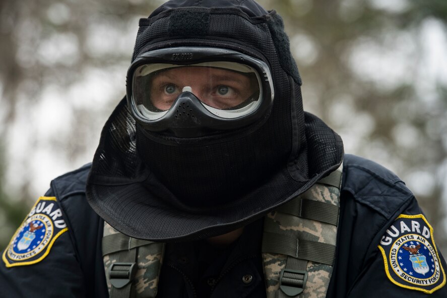 John Kramer, 23d Security Forces Squadron entry controller,
scans his perimeter during a training event, Feb. 22, 2018, at Moody Air Force Base, Ga. “Shoot, move, communicate” is a training event that tests participants on their ability to move from barricade to barricade as a team. While one member provided covering fire the others advanced on the enemy, then retreated from the scenario while they maintained cover fire. Security Forces members would employ these tactics anytime they’re under enemy fire. (U.S. Air Force photo by Senior Airman Janiqua P. Robinson)