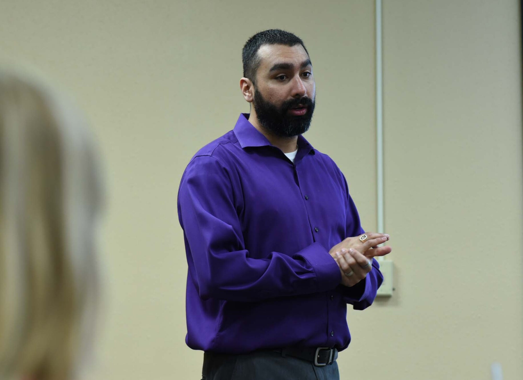 Mr. Scott Palomino, director of the 301st Fighter Wing Airman and Family Readiness Center, speaks during a Heartlink event for active duty spouses Feb. 15, 2018 at the Lone Star Center on Naval Air Station Fort Worth Joint Reserve Base, Texas. The Heartlink program helps active duty spouses acclimate to the Air Force and understand their importance to the mission. (U.S. Air Force photos by Melissa Harvey)