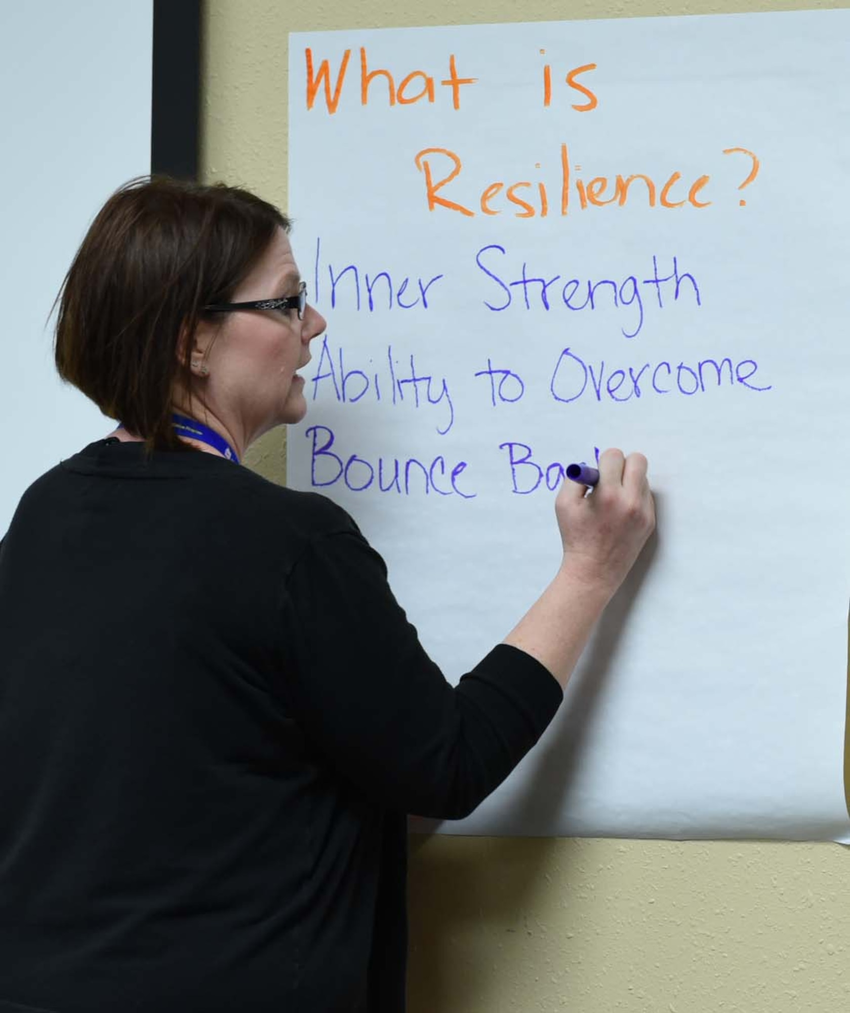 Ms. Mary Arnold, director of psychological health, gives a presentation about resilience during a Heartlink event for active duty spouses Feb. 15, 2018 at the Lone Star Center on Naval Air Station Fort Worth Joint Reserve Base, Texas. The Heartlink program helps active duty spouses acclimate to the Air Force and understand their importance to the mission. (U.S. Air Force photos by Melissa Harvey)