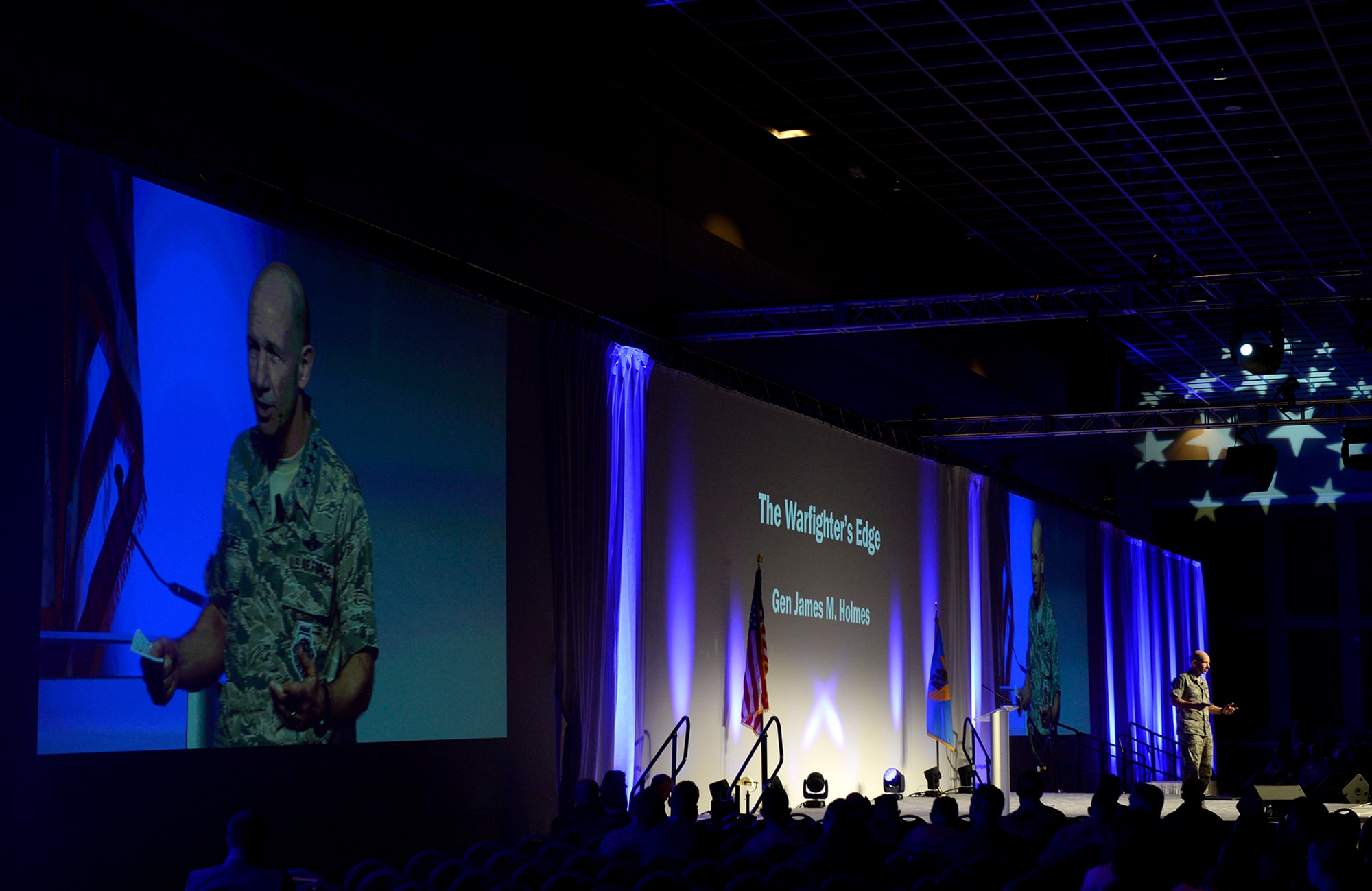 Photo of Gen. Mike Holmes speaking at the 2018 Air Warfare Symposium in Orlando, Florida, Feb. 23, 2018.