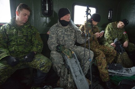 U.S., Allied, and partner-nation Soldiers from nine countries participate in the Cold Regions Military Collaborative Training Event at Arctic Valley in Joint Base Elmendorf-Richardson, Alaska, Feb. 22, 2018. The U.S. Army Alaska hosted event focused on strengthening relationships among allied and partner nations with experience operating in cold weather, and at high elevations; and set conditions for future collaboration.