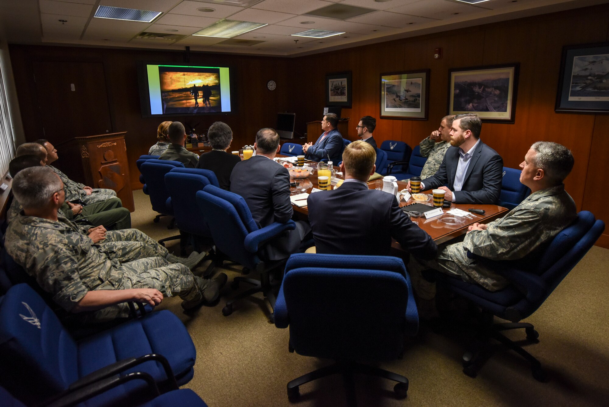 Members of 4th Fighter Wing leadership and staff delegates from the offices of North Carolina Sens. Richard Burr and Thom Tillis watch the wing mission video, Feb. 21, 2018, at Seymour Johnson Air Force Base, North Carolina. The congressmen's representatives toured several facilities on base to get a better understanding of the impact Seymour Johnson AFB has on both the local community and the Air Force as a whole. (U.S. Air Force photo by Staff Sgt. Brittain Crolley)