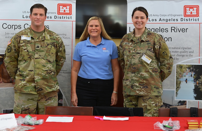 From left to right, Capt. David Watts, retired LA District employee Jody Fischer and 1st Lt. Kerry Horan, all with the U.S. Army Corps of Engineers Los Angeles District, pose for a photo before the Engineering and Environmental Science Academy Career Exploration Showcase Feb. 14 at John Muir High School in Pasadena, California.