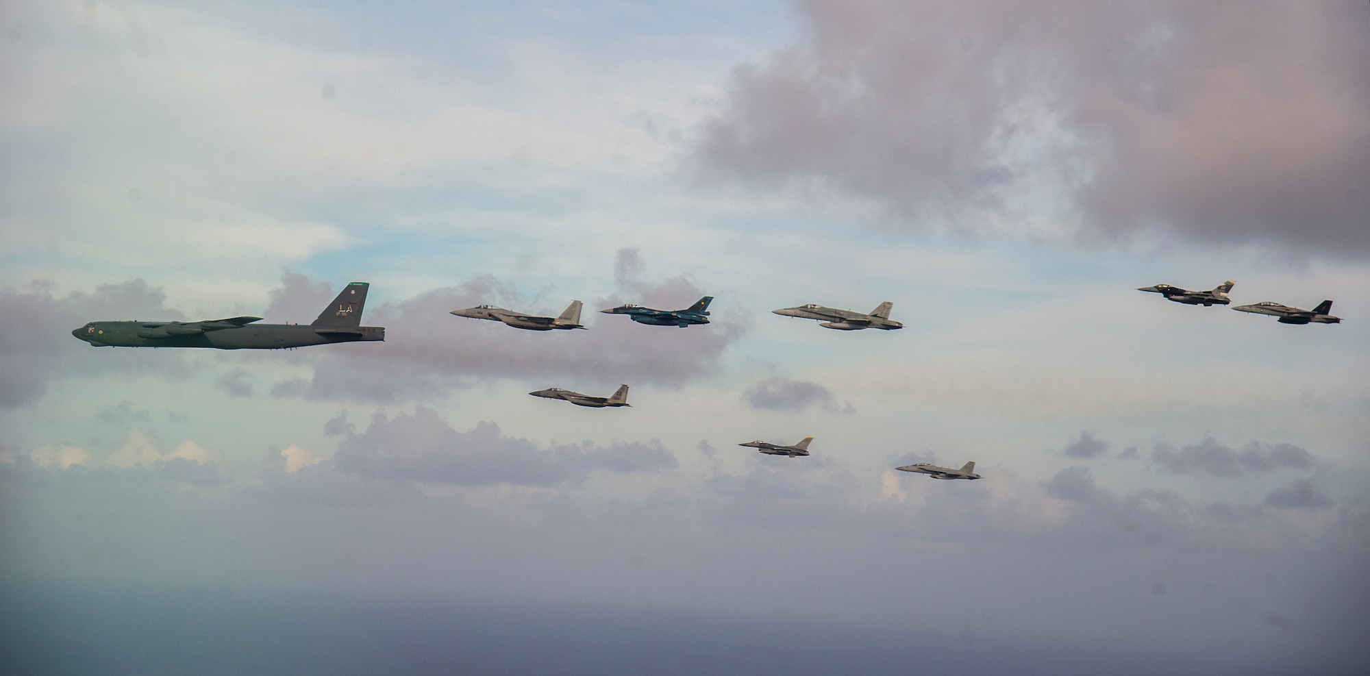 U.S. Air Force, Marine Corps and Navy aircraft fly in formation alongside Japan Air Self-Defense Force and Royal Australian Air Force aircraft during exercise Cope North 18 in the vicinity of Guam, Feb. 21, 2018. Cope North is a long-standing exercise designed to strengthen relationships in the Indo-Pacific region through air operations, humanitarian assistance/disaster relief training.