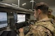 Staff Sgt. Marc Cooperman, an explosive ordnance disposal team member from the 379th Expeditionary Civil Engineer Squadron, remotely controls an F6B robot during a training scenario at Al Udeid Air Base, Qatar, Feb. 15, 2018. The exercise, a collaborative effort between security forces and the explosive ordnance disposal flight, simulated a vehicle borne improvised explosive device threat. (U.S. Air Force photo by Staff Sgt. Joshua Horton)