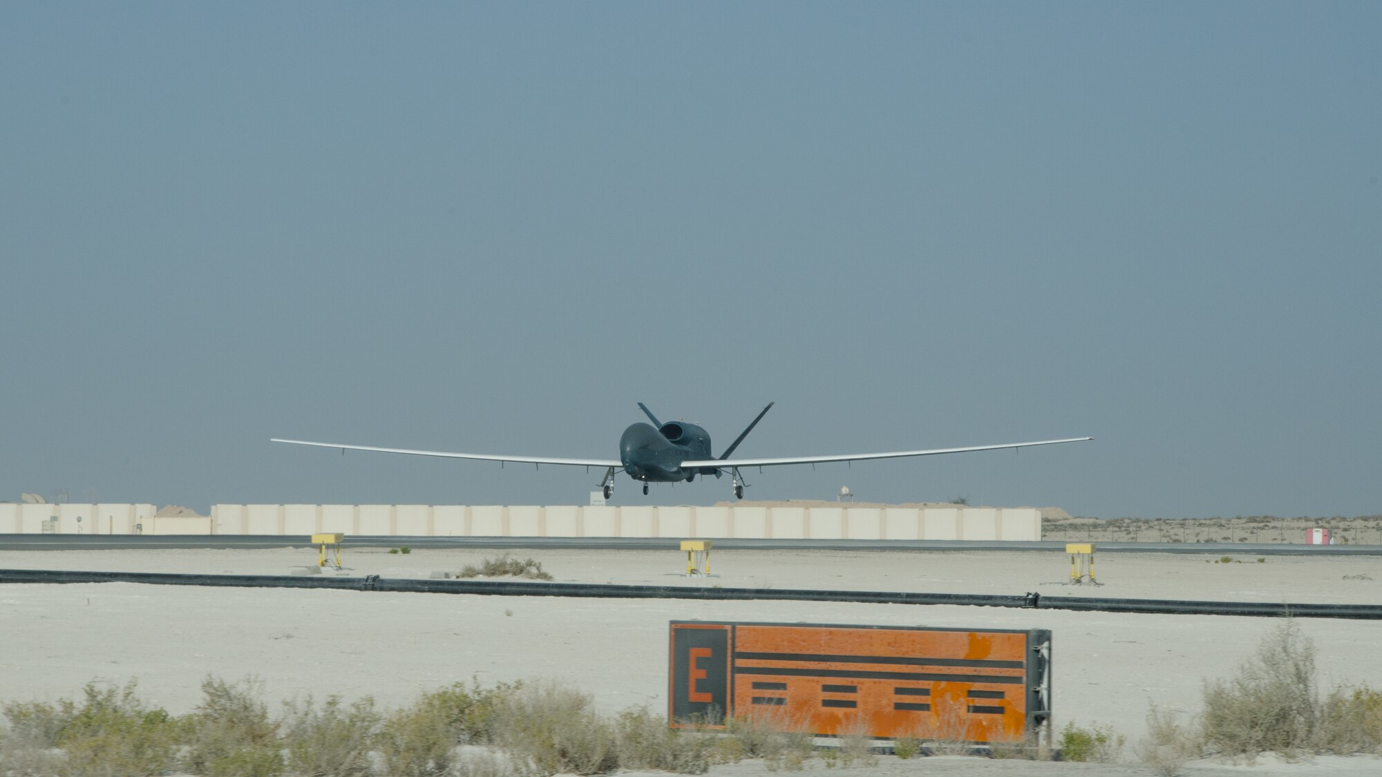 An U.S. Air Force RQ-4 Global Hawk logs over 20,000 flight hours Feb. 13, 2018 at Al Dhafra Air Base, United Arab Emirates. The Global Hawk's mission is to provide a broad spectrum of ISR collection capability to support joint combatant forces in worldwide peacetime, contingency and wartime operations. (U.S. Air National Guard photo by Staff Sgt. Colton Elliott)