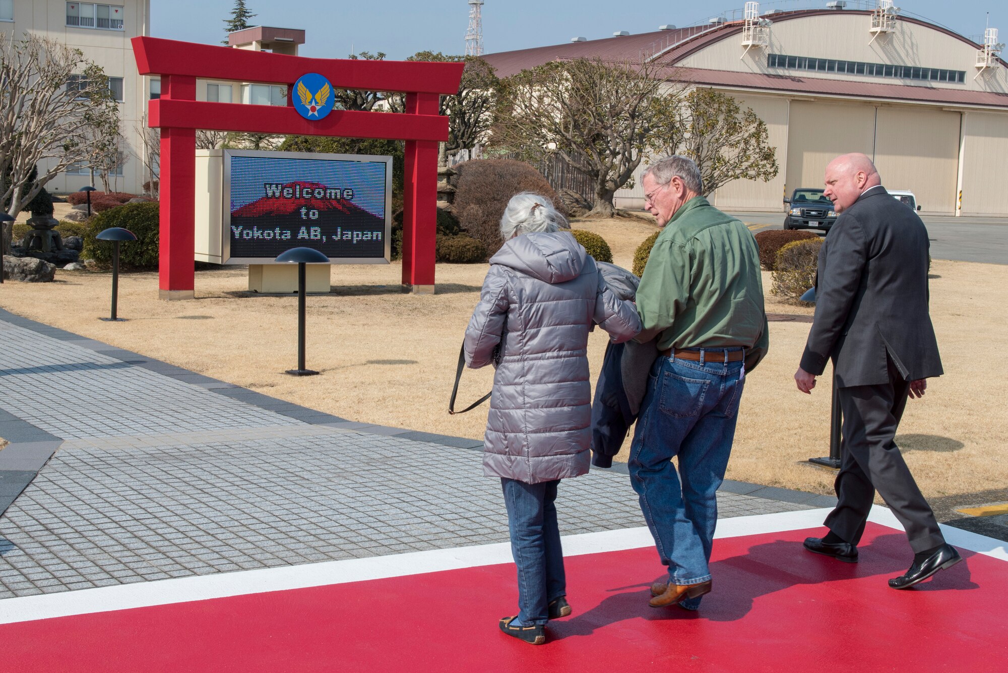 Sen. James Inhofe, R-O.K., walks with his wife Kay after his congressional delegation arrived at Yokota Air Base, Japan, Feb. 24, 2018.