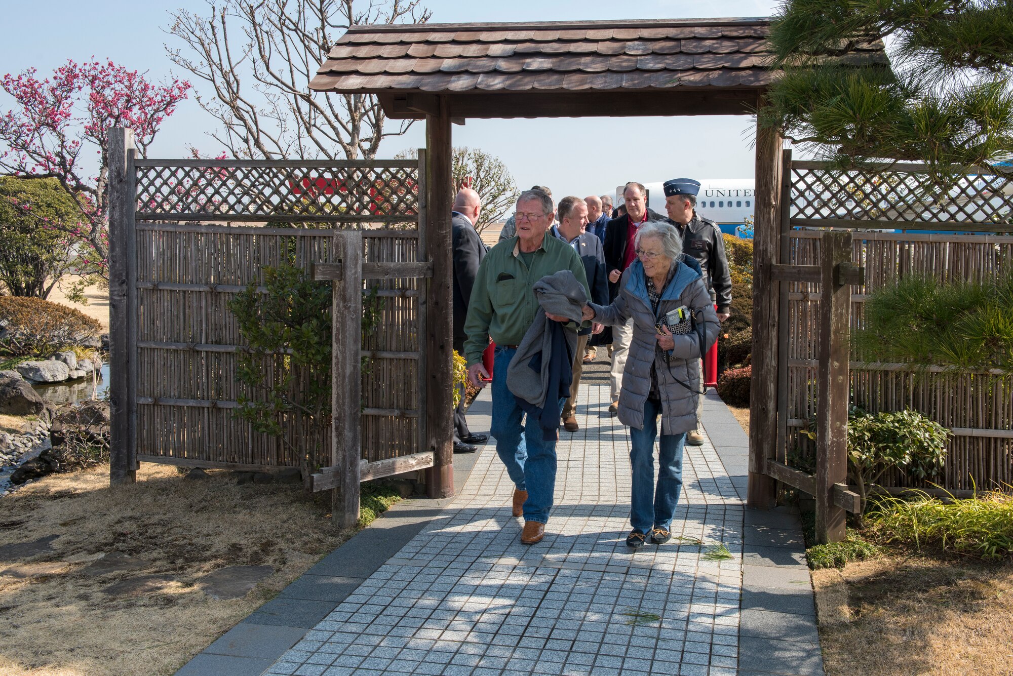 Sen. James Inhofe, R-O.K., walks with his wife Kay after his congressional delegation arrived at Yokota Air Base, Japan, Feb. 24, 2018.