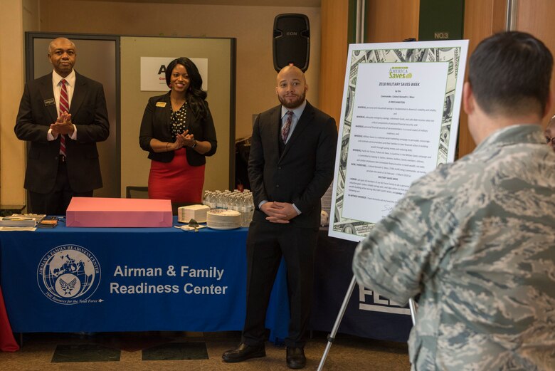 Col. Sergio Vega, 374th Airlift Wing vice commander, addresses those in attendance about the importance of financial saving at the Military Saves kickoff ceremony at Yokota Air Base, Japan, Feb. 26, 2018.