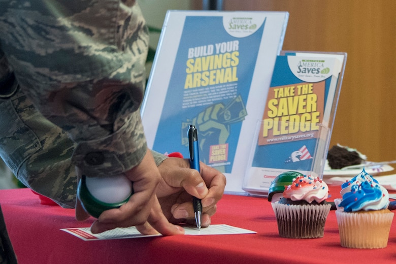 An Airman takes the saver’s pledge as part of the Military Saves campaign at Yokota Air Base, Japan, Feb. 26, 2018.