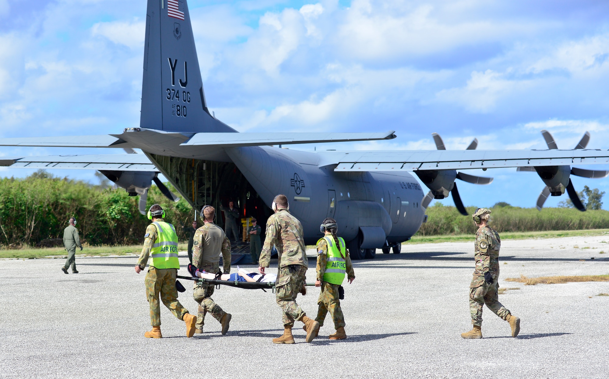 U.S. Air Force (USAF), Koku Jieitai (Japan Air Self-Defense) and Royal Australian Air Force members (RAAF) utilize a USAF C-130J Super Hercules  to perform logistical re-supply, medical evacuation, troop movement and humanitarian assistance during exercise COPE NORTH 18 at Tinian, U.S. Commonwealth of the Northern Marianas Islands, Feb. 19. Through exercises and engagements during COPE NORTH, USAF, Koku Jieitai and RAAF increase interoperability for humanitarian assistance/disaster relief operations. (U.S. Air Force photo by Airman 1st Class Christopher Quail)