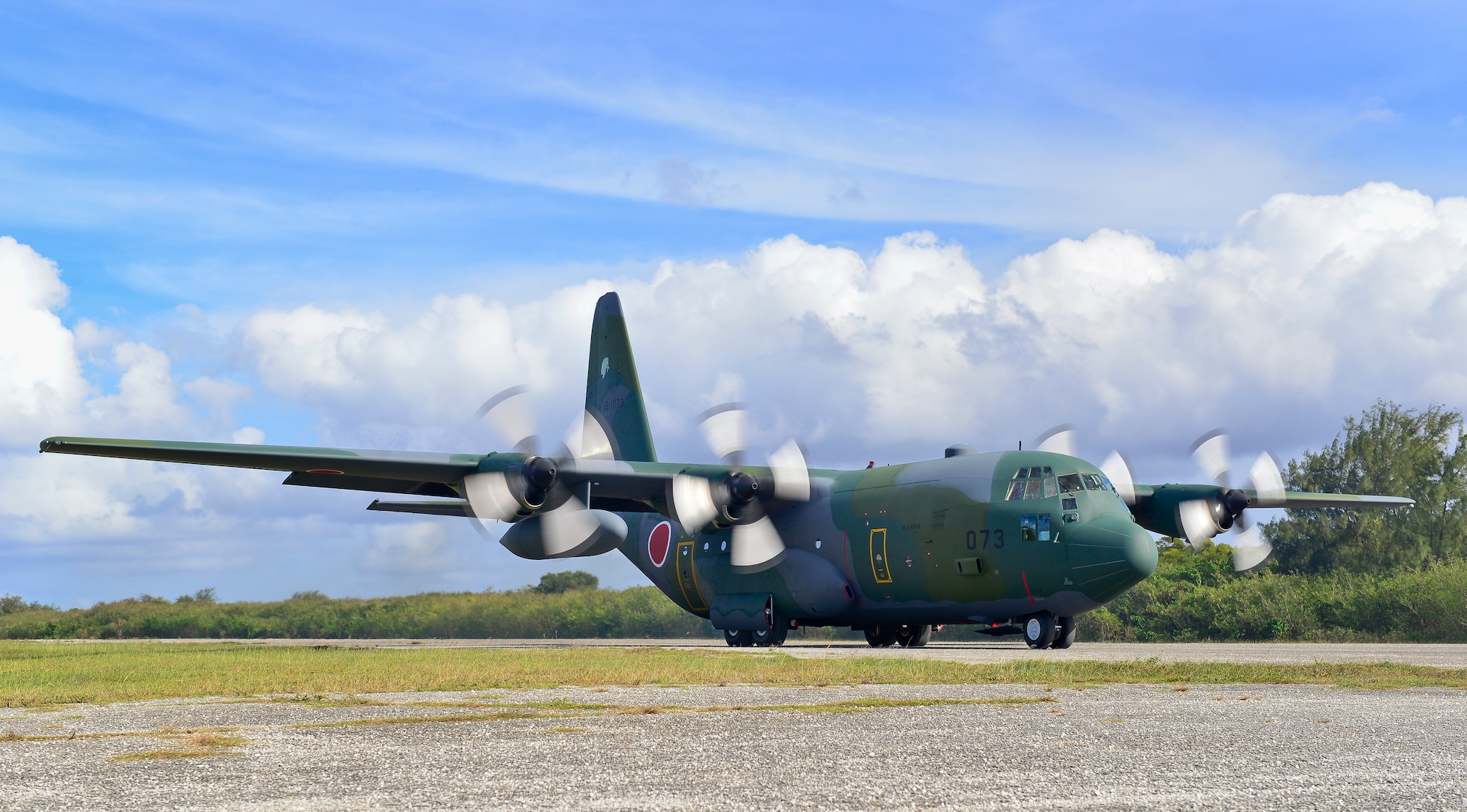 A Koku Jieitai (Japanese Air Self-Defense Force) C-130H Hercules lands on Tinian, U.S. Commonwealth of the Northern Marianas Islands, during exercise COPE NORTH 18, Feb. 21. Through exercises and engagements during COPE NORTH, United States Air Force, Koku Jieitai (Japan Air Self-Defense Force) and Royal Australian Air Force increase interoperability for humanitarian assistance/disaster relief operations. (U.S. Air Force photo by Airman 1st Class Christopher Quail)