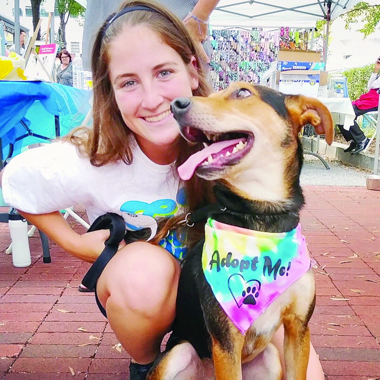 Marine Corps Cpl. Kayla Soles volunteers for Operation Paws for Homes, an all-breed rescue organization that operates in Virginia, Maryland, Washington and south-central Pennsylvania, Aug. 26, 2017. Marine Corps photo by Valerie OBerry