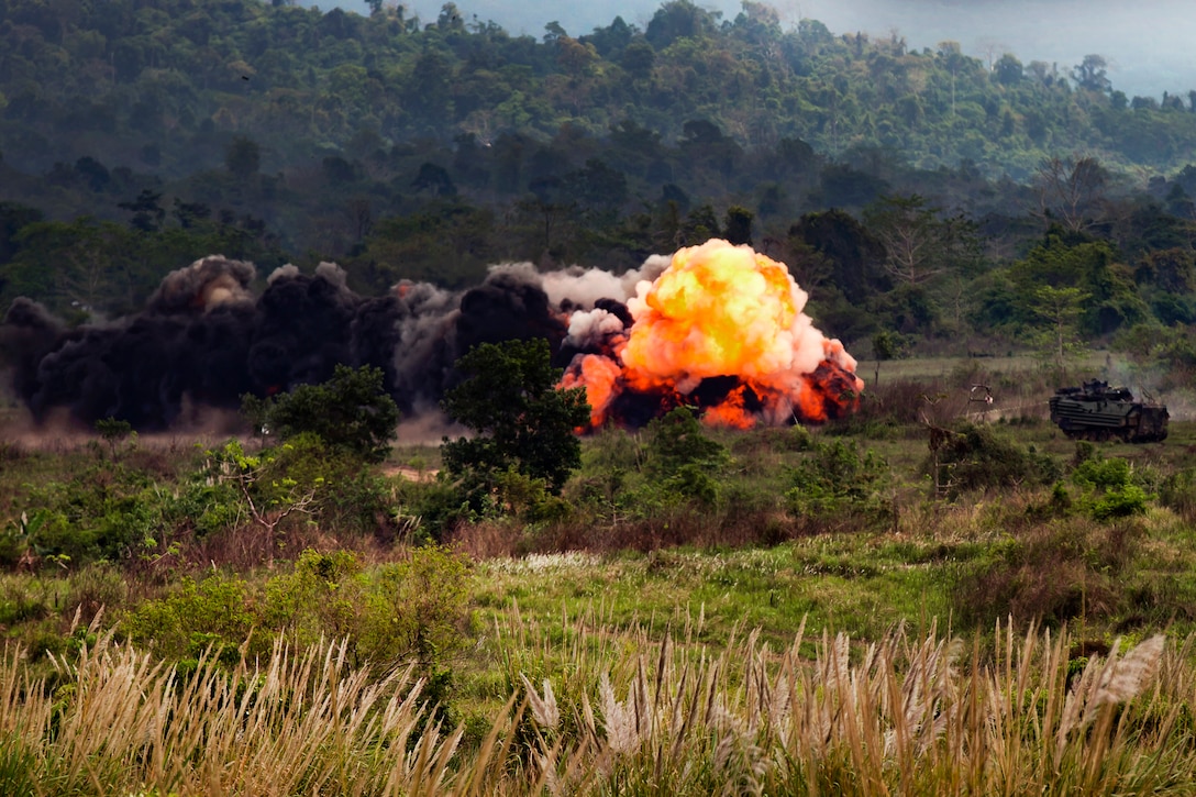 Marines detonate a mine clearing line charge to allow friendly forces to maneuver through a simulated minefield.
