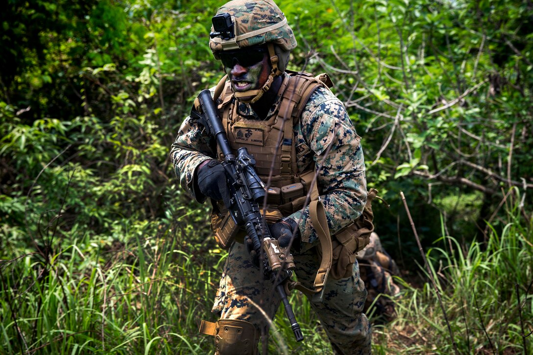 Marine Corps Sgt. Justice Appiah rushes towards his next objective.