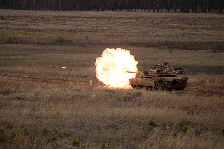 An M1A1 Abrams tank with 2nd Tank Battalion, 2nd Marine Division engages a target during semi-annual qualifications as part of a deployment for training exercise at Fort Stewart, Ga., Feb. 13, 2018. The DFT provides the opportunity to overcome home station range limitations as well as exercise the battalion’s capability to deploy equipment and personnel.