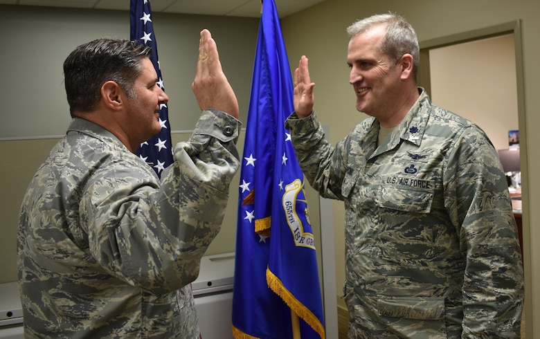 655th Intelligence, Surveillance and Reconnaissance Group Commander Col. J.D. McKaye (left) administers the Oath of Office to newly promoted colonel, Col. Joseph T. Marcinek, 655th ISRG deputy commander, during the February 24, 2018 unit training assembly here