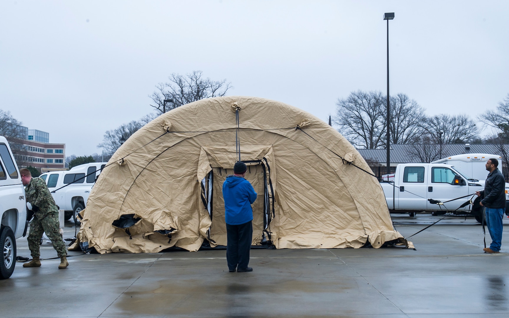 Members of Joint Task Force Civil Support set up a new tent during a tent exercise.