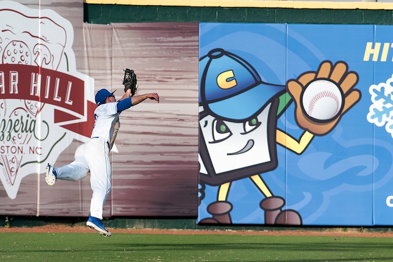 Air Force Academy center fielder Daniel Jones runs down a well-hit ball to right center Feb. 24, 2018, during the Freedom Classic baseball tournament at Grainger Stadium in Kinston, North Carolina. Jones is a third-year cadet at the Air Force Academy originally from Coppell, Texas. Navy took games one and two of the three-game series against the Air Force Academy. (U.S. Air Force photo by Tech. Sgt. David W. Carbajal)