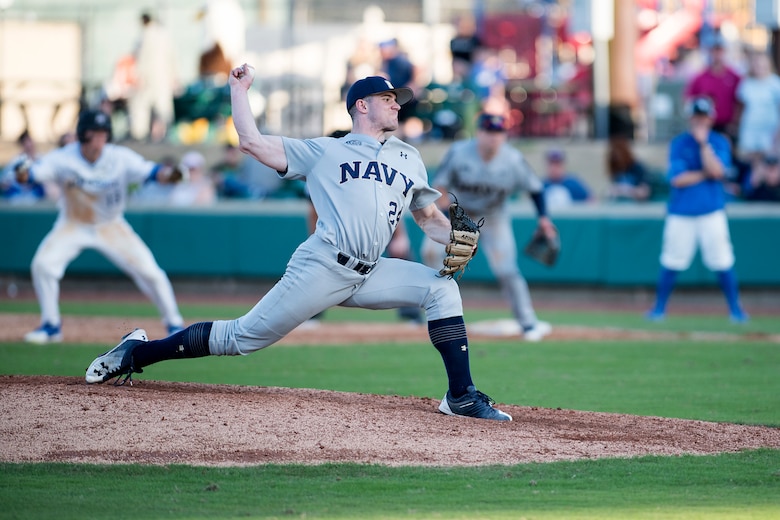 Naval Academy closer Tommy Goodridge throws to home plate Feb. 24, 2018, during the Freedom Classic baseball tournament at Grainger Stadium in Kinston, North Carolina. Goodridge is a first-year cadet at the Naval Academy originally from San Diego. Navy took games one and two of the three game series against the Air Force Academy. (U.S. Air Force photo by Tech. Sgt. David W. Carbajal)