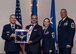 Dr. Andrew M. Akin, Professor of National Security Studies at the Air Command and Staff College at Maxwell-Gunter Air Force Base, Alabama, receives the 2017 Non-supervisory Civilian of the Year Award from Lt. Gen. Steve Kwast, Commander of AETC, during the AETC 12 Outstanding Airmen of the Year Awards banquet Feb. 22, 2018 in Orlando, Fla. Akin created and assisted seven academic courses, while teaching three courses, transforming Official Professional Military Education (OPME) content for 28,000 Air Force, civilian and joint service students winner of the Minerva Research Grant, as well as chaired an innovation team, producing the first-ever Facebook live and ADOBE Connect live webinars for OPME students. (U.S. Air Force photo by Staff Sgt. Kenneth W. Norman)