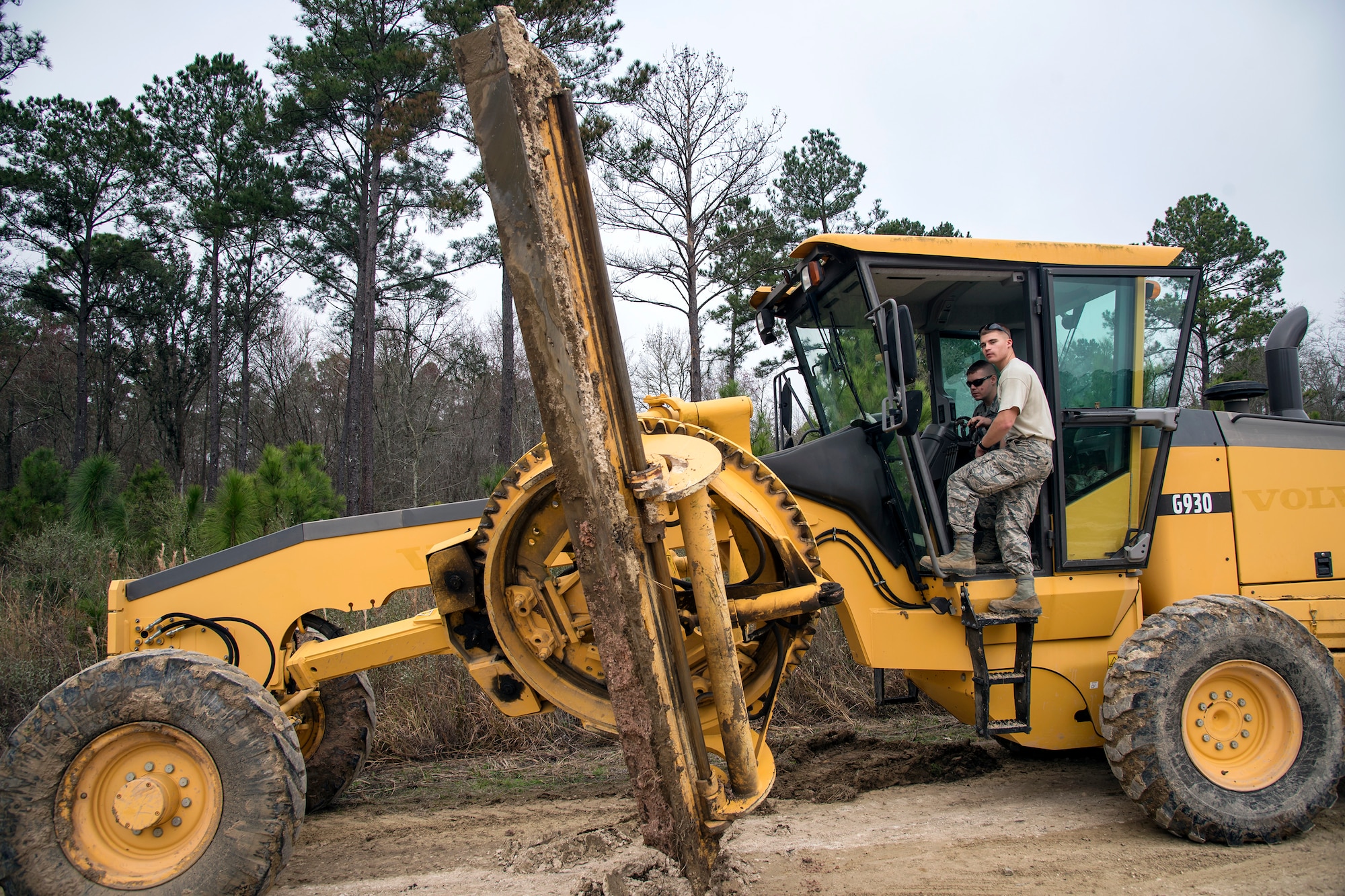 Airman 1st Class Brendan Brown, 23d Civil Engineer Squadron horizontal construction engineer, observes the blade of a grader, Feb. 15, 2018, at Moody Air Force Base, Ga. Airmen from the 23d CES participated in a Prime Base Engineer Emergency Force training day to prepare for some of the wartime tasks they could encounter while in a deployed environment. (U.S. Air Force photo by Airman Eugene Oliver)