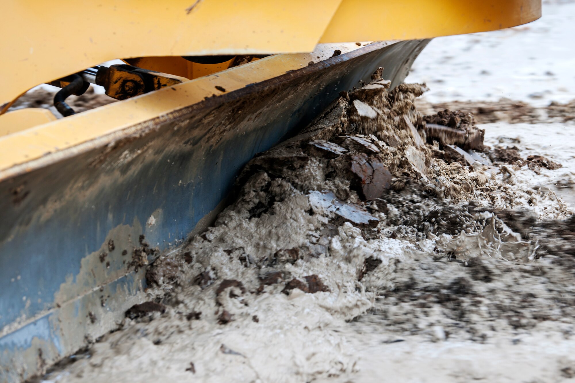 A grader pushes dirt, Feb. 15, 2018, at Moody Air Force Base, Ga. Airmen from the 23d CES participated in a Prime Base Engineer Emergency Force training day to prepare for some of the wartime tasks they could encounter while in a deployed environment. (U.S. Air Force photo by Airman Eugene Oliver)