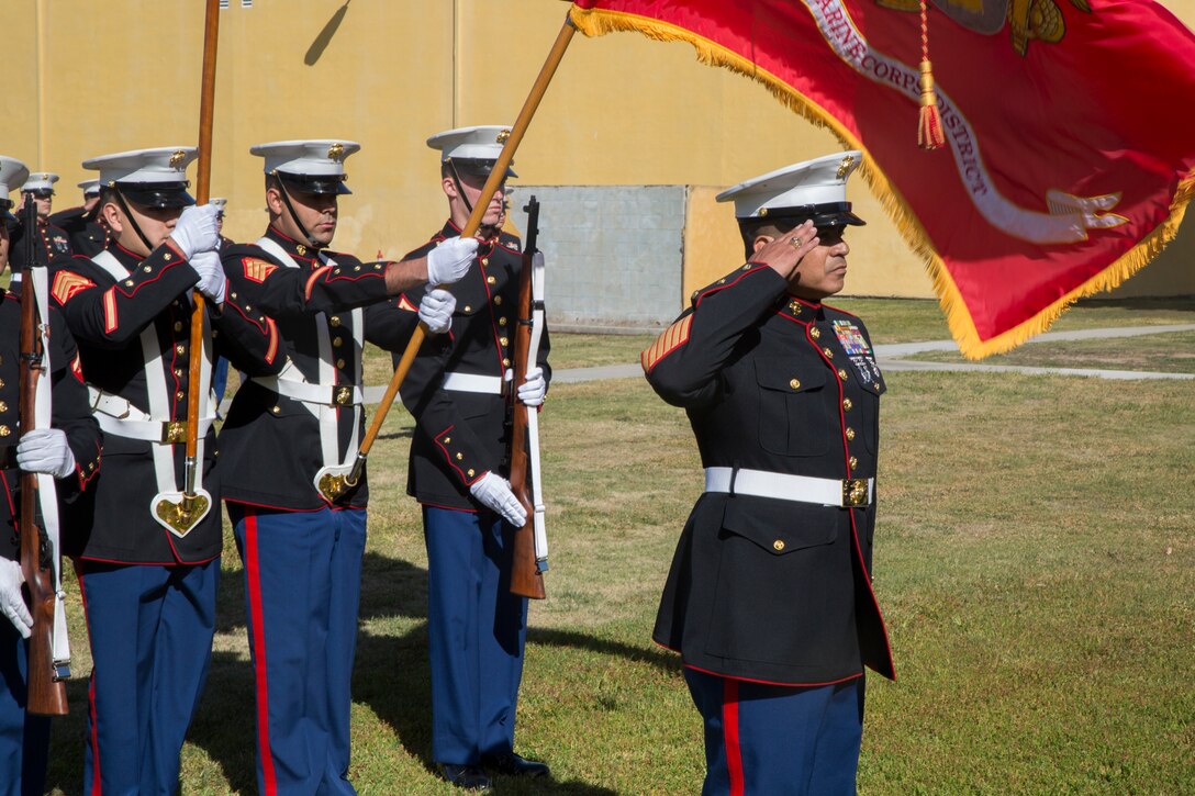 Master Gunnery Sgt. Luis M. Aguilar, renders a salute during the National Anthem at his retirement ceremony aboard Marine Corps Recruit  Depot, San Diego, Feb. 23, 2018. The retirement ceremony was held to honor Aguilar for his 28 years of honorable and faithful service to the United States Marine Corps. (U.S. Marine Corps photo by Sgt. Taylor Schrick)