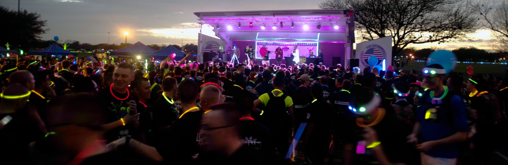 Participants at the  Glow In The Park 5K fun run at MacArthur Field at Joint Base San Antonio-Fort Sam Houston Feb. 24 had fluorescent fun before, during and after the event, thanks to the 502nd Force Support Squadron and local sponsors.