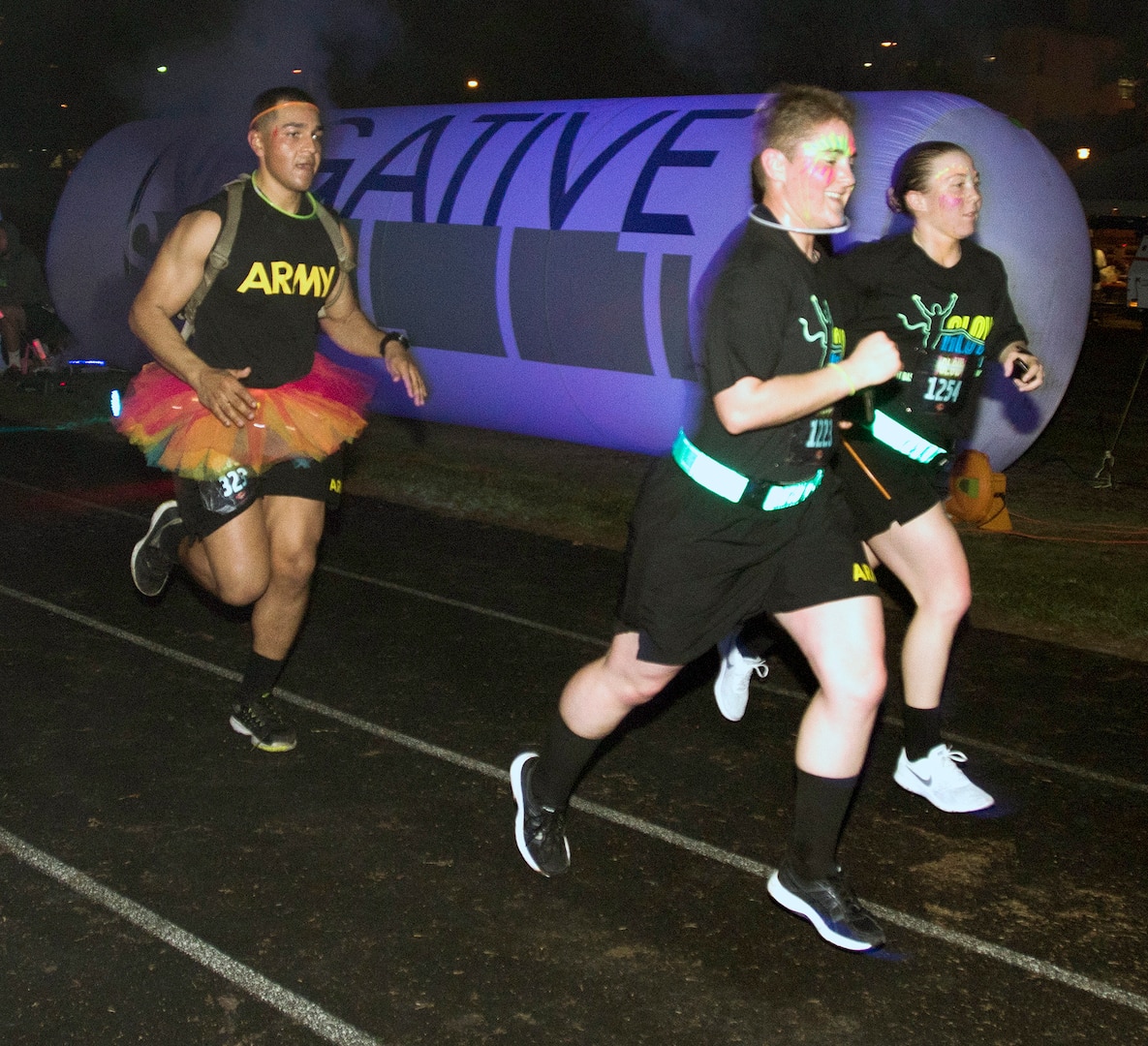 Is that tutu in reg, Soldier? The participants in the annual "Glow In The Park" 5K fun run at MacArthur Park at Joint Base San Antonio-Fort Sam Houston Feb. 24 were encouraged to wear glow-in-the-park paint and wild costumes.