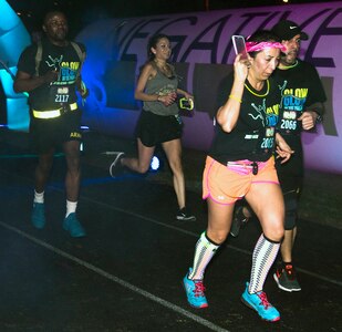 The participants in the annual "Glow In The Park" 5K fun run at MacArthur Park at Joint Base San Antonio-Fort Sam Houston Feb. 24 were encouraged to wear glow-in-the-park paint and wild and colorful clothes.