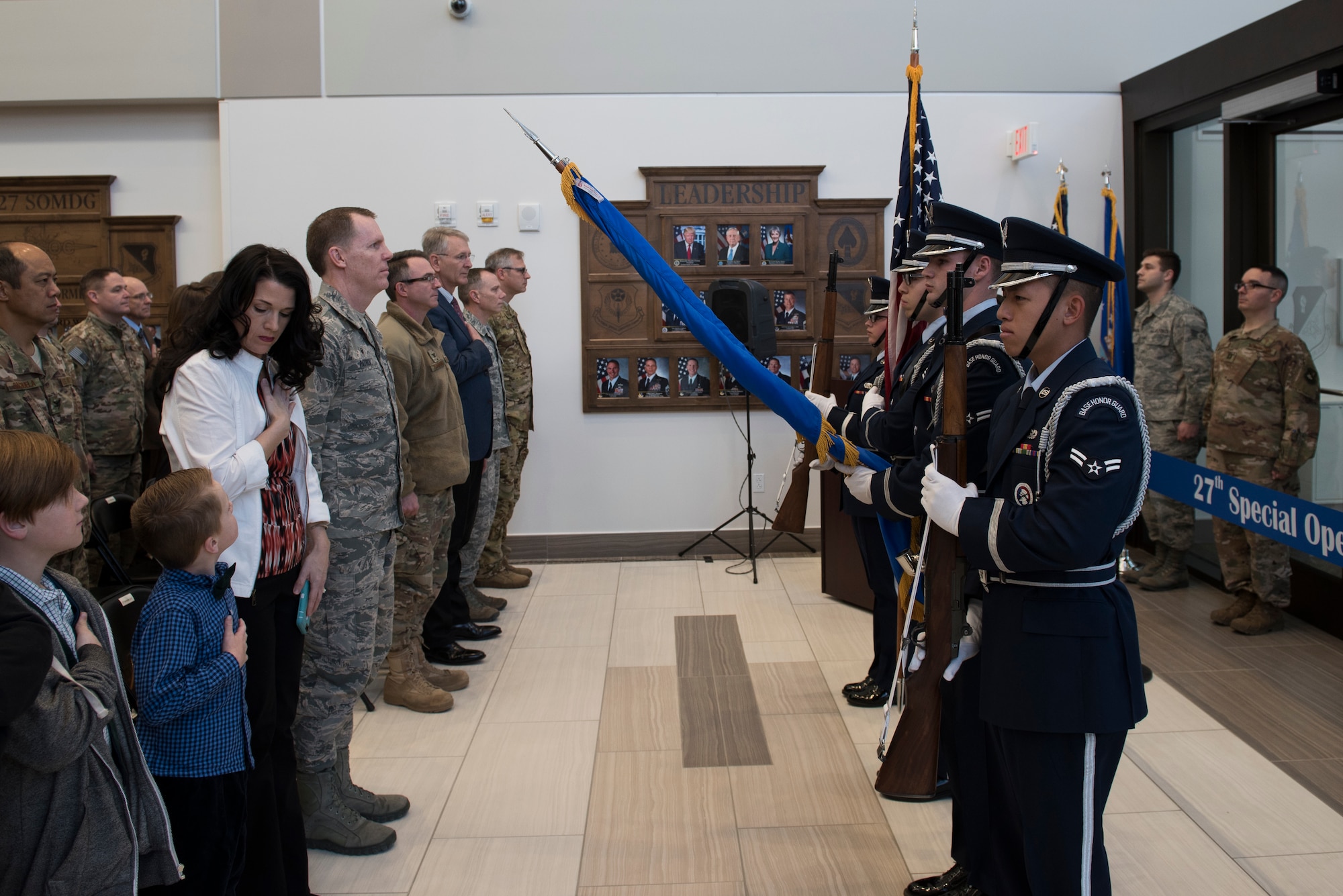 Cannon Air Force Base Honor Guard members present the colors during the 27th Special Operations Medical Group building ribbon cutting ceremony at Cannon AFB, N.M., Feb. 23, 2018. The layout of the new building was designed with patients in mind. Physical therapy and the pharmacy, both high-traffic areas, are located near the main entrance. (U.S. Air Force photo by Staff Sgt. Michael Washburn/Released)
