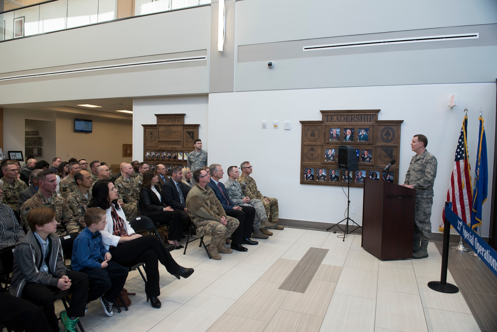 Col. Christopher Patrick, 27th Special Operations Medical Group commander, delivers remarks during the 27th SOMDG building ribbon cutting ceremony at Cannon AFB, N.M., Feb. 23, 2018. The layout of the new building was designed with patients in mind. Physical therapy and the pharmacy, both high-traffic areas, are located near the main entrance. (U.S. Air Force photo by Staff Sgt. Michael Washburn/Released)