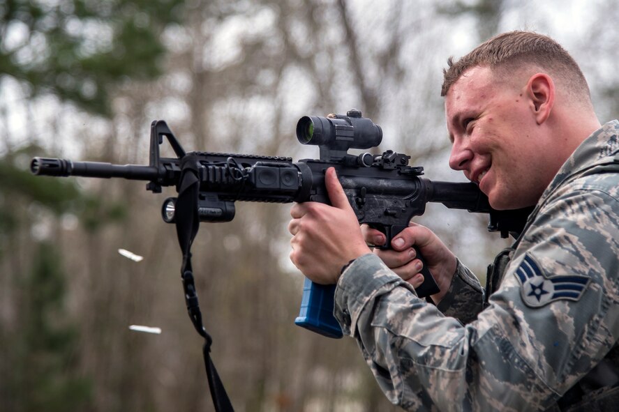 Senior Airman Adam Irwin, 23d Security Forces Squadron installation patrolman, fires an M4 carbine after a training event, Feb. 22, 2018, at Moody Air Force Base, Ga.  The Shoot, move, communicate training event is designed to test participants on their ability to move from barricade to barricade as a team. To be successful, one member provided covering fire while others advanced on the enemy, then retreated from the scenario while they maintained cover fire. Security Forces members could employ these tactics anytime they’re under enemy fire.
(U.S. Air Force photo by Airman Eugene Oliver)