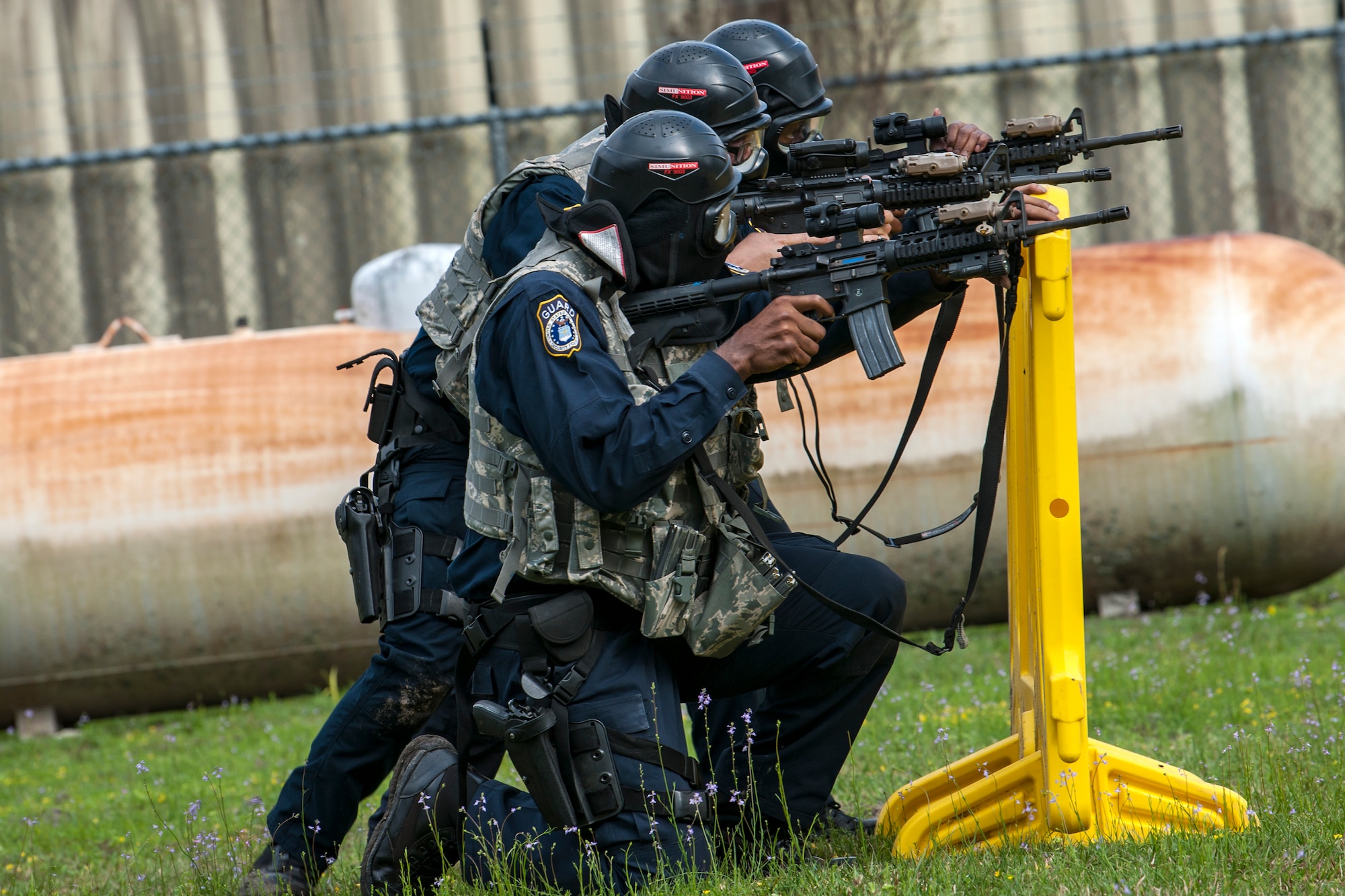 Personnel from the 23d Security Forces Squadron prepare to fire M4 carbines, Feb. 22, 2018, at Moody Air Force Base, Ga.  The Shoot, move, communicate training event is designed to test participants on their ability to move from barricade to barricade as a team. To be successful, one member provided covering fire while others advanced on the enemy, then retreated from the scenario while they maintained cover fire. Security Forces members could employ these tactics anytime they’re under enemy fire.
(U.S. Air Force photo by Airman Eugene Oliver)