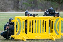 Personnel from the 23d Security Forces Squadron defend their positions during a shoot, move, communicate, training, Feb. 22, 2018, at Moody Air Force Base, Ga.  The Shoot, move, communicate training event is designed to test participants on their ability to move from barricade to barricade as a team. To be successful, one member provided covering fire while others advanced on the enemy, then retreated from the scenario while they maintained cover fire. Security Forces members could employ these tactics anytime they’re under enemy fire.
(U.S. Air Force photo by Airman Eugene Oliver)