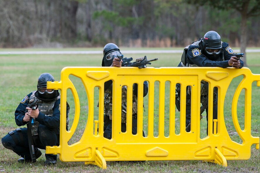 Personnel from the 23d Security Forces Squadron defend their positions during a shoot, move, communicate, training, Feb. 22, 2018, at Moody Air Force Base, Ga.  The Shoot, move, communicate training event is designed to test participants on their ability to move from barricade to barricade as a team. To be successful, one member provided covering fire while others advanced on the enemy, then retreated from the scenario while they maintained cover fire. Security Forces members could employ these tactics anytime they’re under enemy fire.
(U.S. Air Force photo by Airman Eugene Oliver)