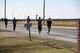 Competitors race in the 17th annual Polar Bear Plunge event hosted by the 17th Force Support Squadron around Lake Nasworthy in San Angelo, Texas Feb. 24, 2018. This is the second year that the event has included a run before the swim. (U.S. Air Force photo by Airman 1st Class Seraiah Hines/Released)