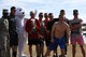 Members of the 312th Training Squadron, winners of this year’s trophy, stand with the 17th Force Support Squadron Polar Bear at the Polar Bear Plunge event at Lake Nasworthy, in San Angelo, Texas, Feb. 24, 2018. The trophy was awarded to the unit with the most participants in the plunge portion of the event on the lake. (U.S. Air Force photo by Airman 1st Class Seraiah Hines/Released)