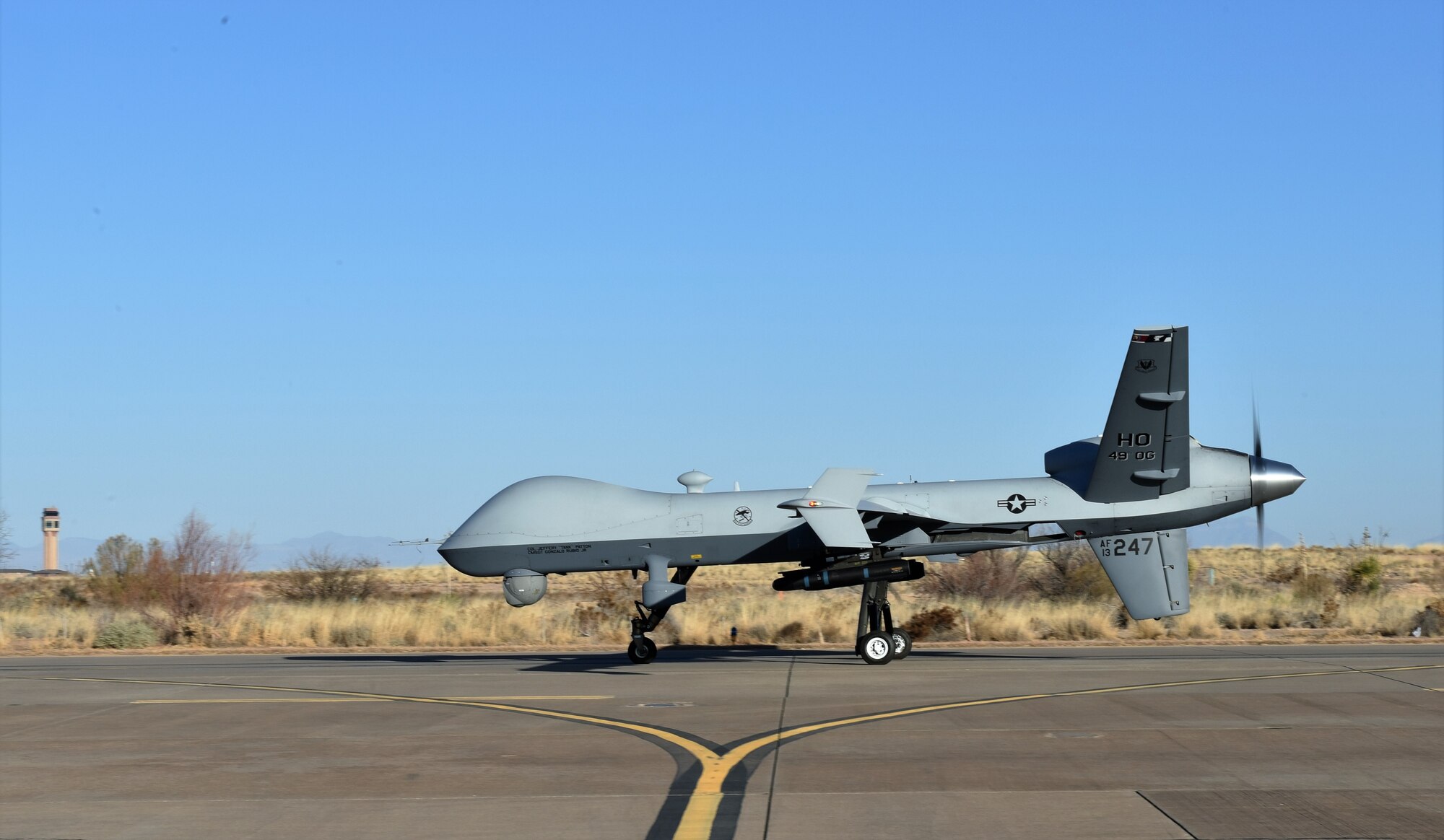 An MQ-9 Reaper taxis out during a phase II exercise at Holloman Air Force Base, N.M., Feb. 22, 2018. The phase II’s objective was to train and prepare Holloman Airmen for threats including chemical, biological, radiological and nuclear attacks. (U.S. Air Force photo by Staff Sgt. Timothy Young)