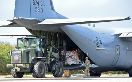 U.S. Air Force (USAF), Koku Jieitai (Japan Air Self-Defense) and Royal Australian Air Force (RAAF) members utilize a USAF C-130J Super Hercules to perform logistical re-supply, medical evacuation, troop movement and humanitarian assistance during exercise COPE NORTH 18 at Tinian, U.S. Commonwealth of the Northern Marianas Islands, Feb. 20. Through exercises and engagements during COPE NORTH, USAF, Koku Jieitai and RAAF increase interoperability for humanitarian assistance/disaster relief operations. (U.S. Air Force photo by Airman 1st Class Christopher Quail)