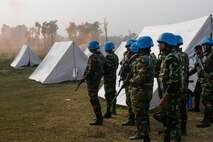 Bangladesh Army soldiers of the Engineer Corps prepare to counter attack role-players during a rehearsal for a demonstration as part of Exercise Shanti Doot 4 in Bangladesh.