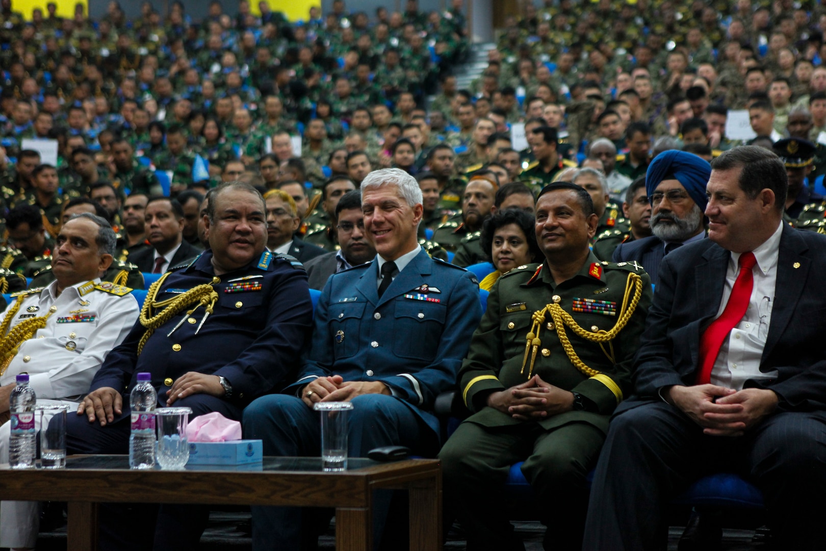 Multinational military leaders and dignitaries converse before the opening ceremony of Exercise Shanti Doot 4 in Bangladesh.