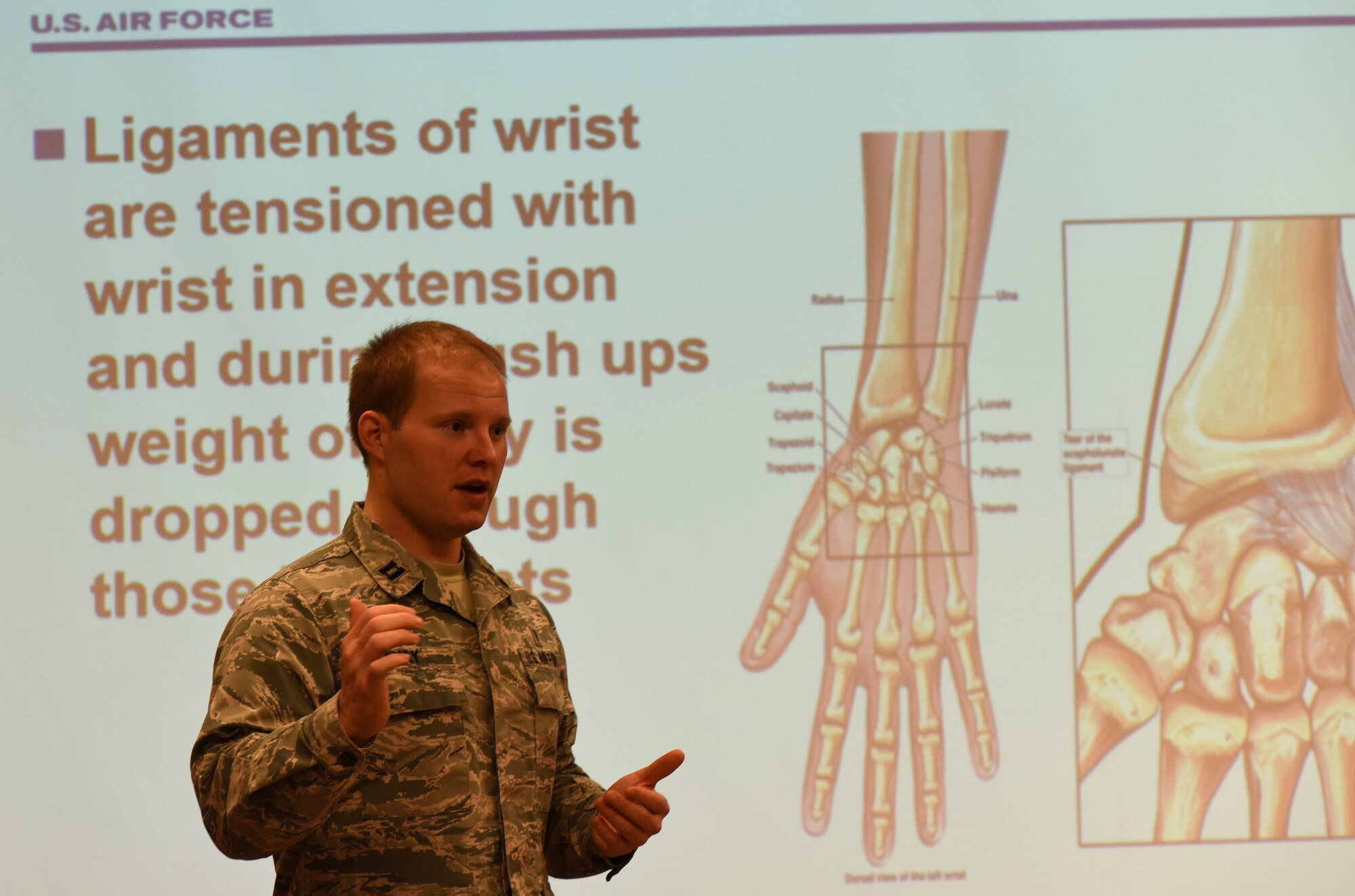 Individual gives a briefing on physical therapy techniques