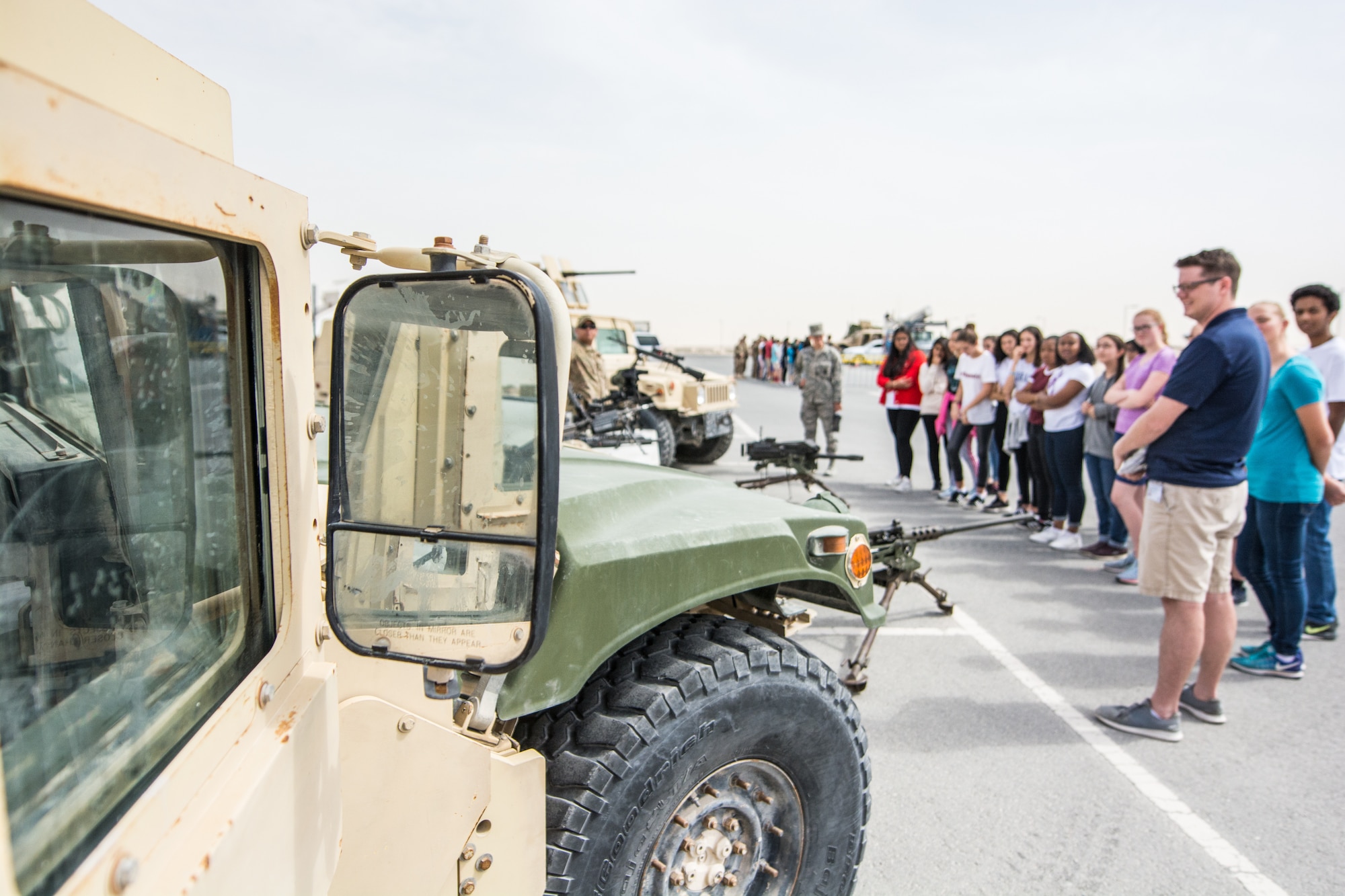 Eighth grade students learn about the mission of Al Udeid Air Base