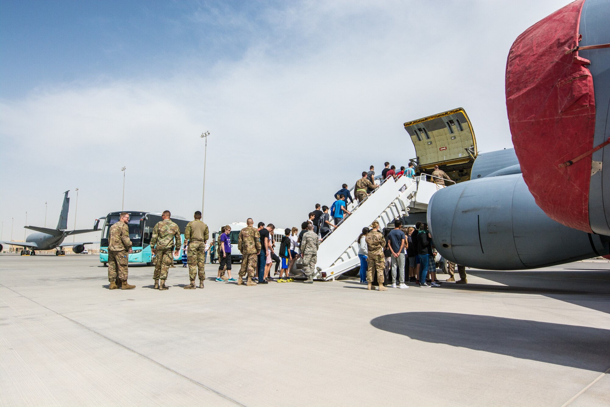 Eighth grade students learn about the mission of Al Udeid Air Base