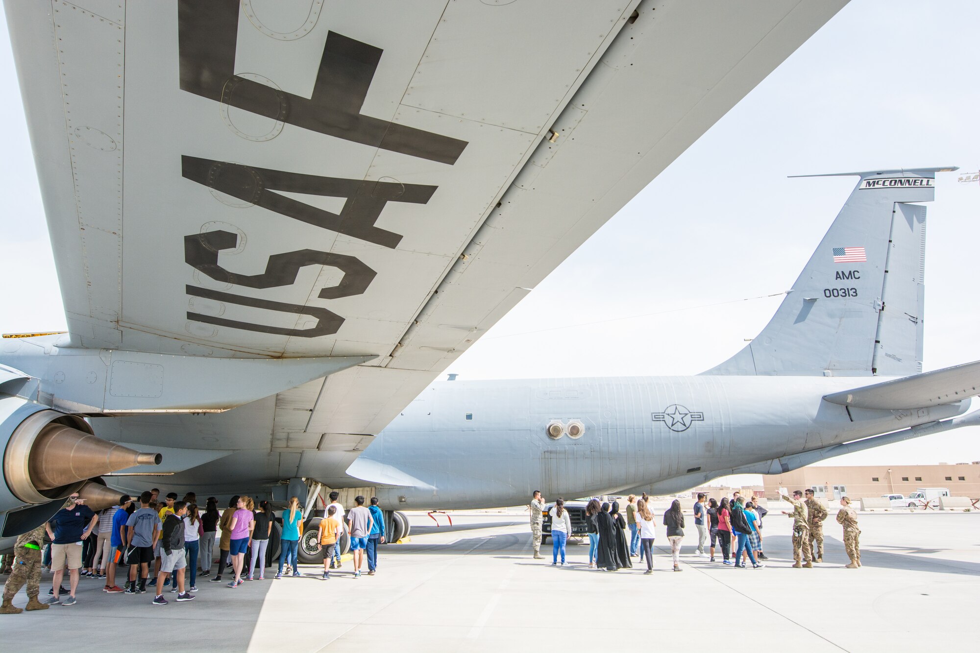 Eighth grade students learn about the mission of Al Udeid Air Base